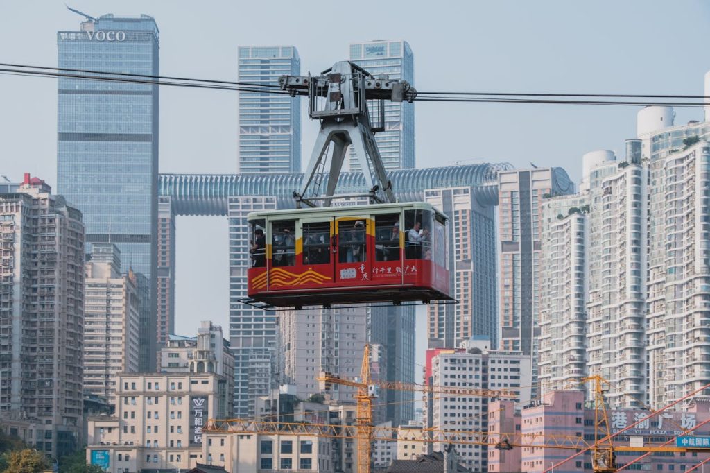 pexels photo 23879108 2 Chongqing's iconic cable car traversing the skyline, showcasing urban architecture.